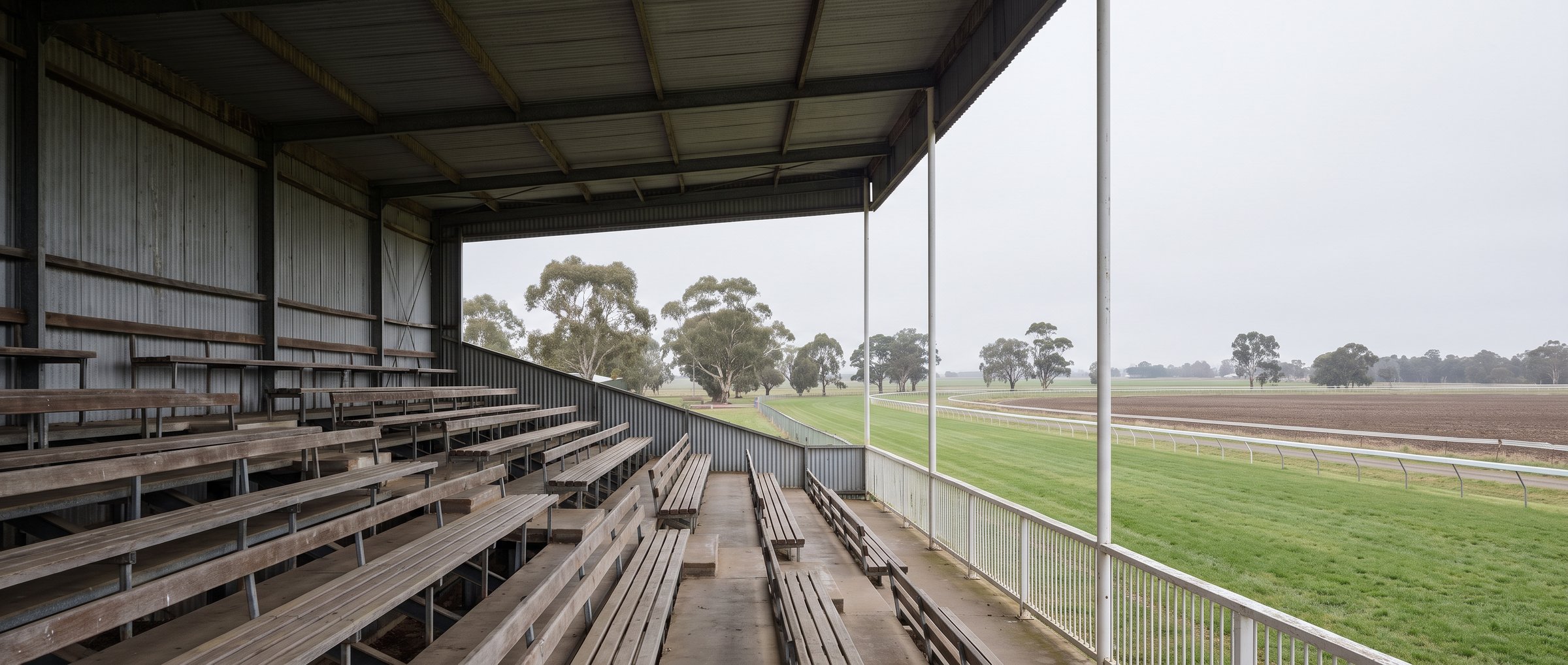 The exterior of a suburban Australian community sports club under an overcast sky